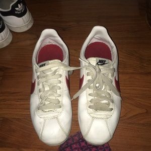 blue and red nike cortez sneakers